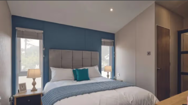 Stylish Double Bedroom With Blue Featured Wall And