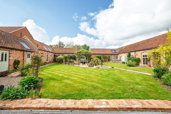 Expansive courtyard in the centre of this substantial plot