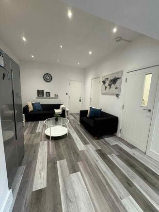 Modern and inviting living room featuring sleek...