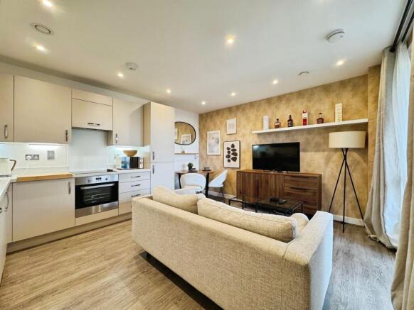Reception/kitchen/dining area