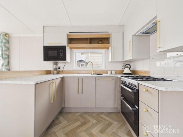 Swift Burgundy modern fitted kitchen at Lossiemout