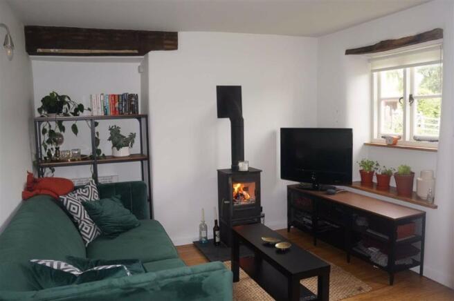 Sitting room 10'10" x 10' minimum