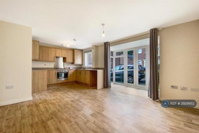 Open Plan Living & Kitchen With Access To Outside