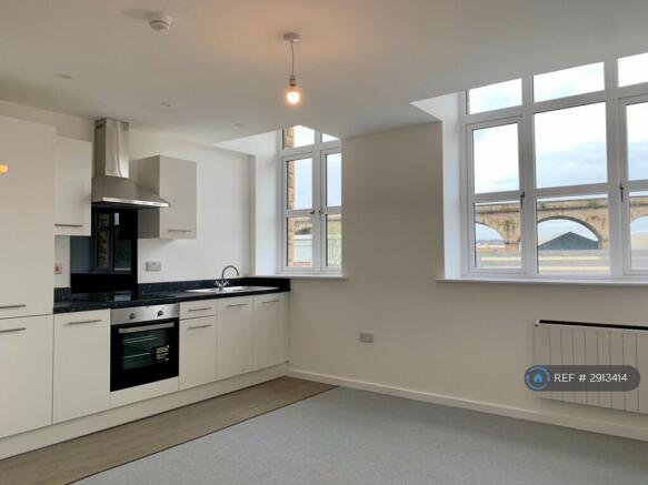 Kitchen/Living 1 - Before Blinds Installation