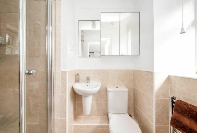 BEDROOM ONE EN-SUITE SHOWER ROOM