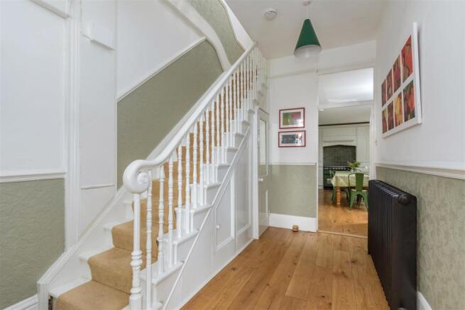 Stairs rising to First Floor