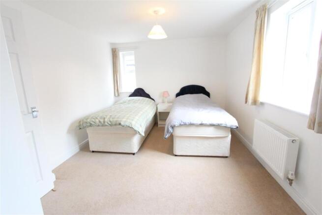 BEDROOM TWO TO REAR