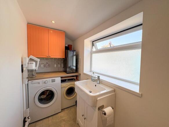 Utility room with downstairs WC