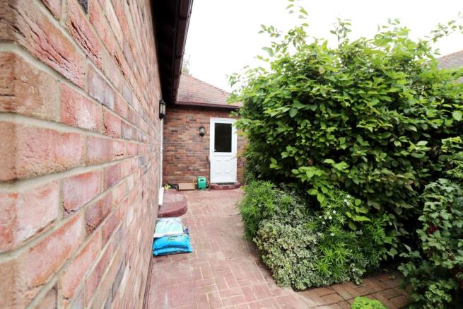 SIDE ACCESS TO FRONT AND REAR ACCESS TO GARAGE
