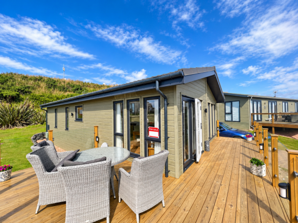 Spacious Wraparound Decking With Outdoor Seating A