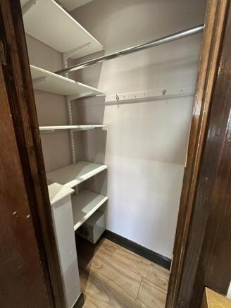 Ample built-in storage with adjustable shelving...