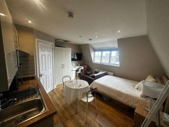 Bright, well-presented studio with a fitted kit...