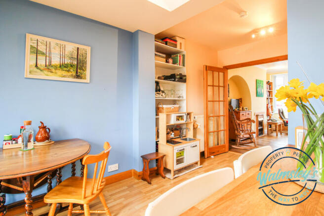 Dining with sitting room beyond