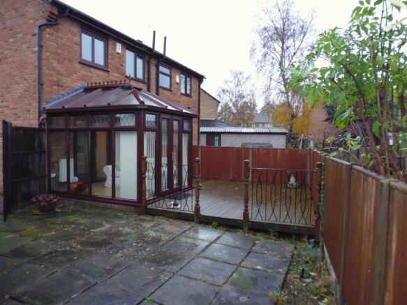 OUTSIDE TO REAR