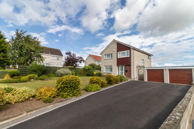 Front Elevation, Drive And Double Garage