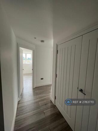 Hallway With Storage Cupboard