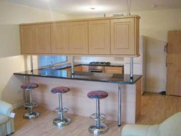 Modern open kitchen with stylish breakfast bar...