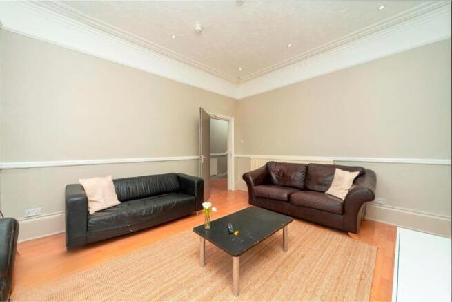 Spacious, bright lounge with modern sofas...