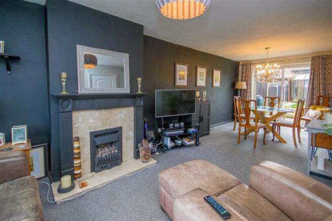 THROUGH LOUNGE/DINING ROOM