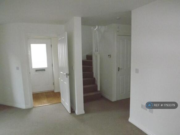 Living Room And Stairs