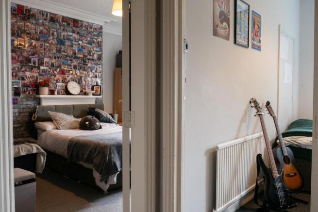 A bright and welcoming living room featuring a ...