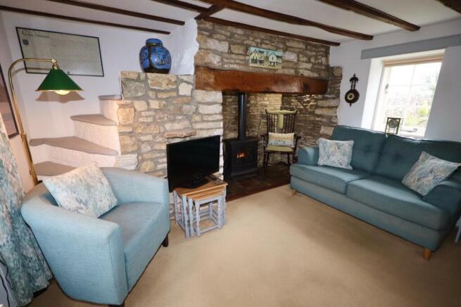 Sitting room with inglenook fireplace