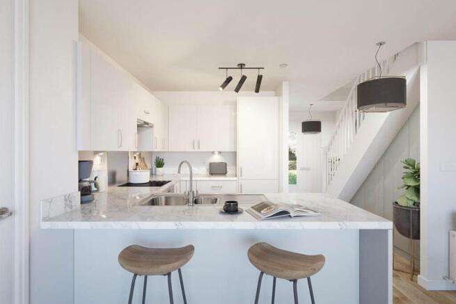 Kitchen with breakfast bar to provide additional seating