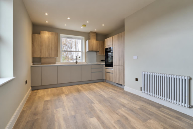 Seamless Modern Kitchen with Hidden Washer.png