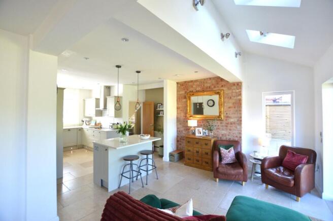 OPEN PLAN L-SHAPED LIVING DINING KITCHEN