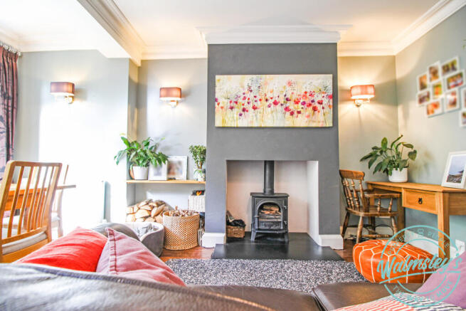 Log burner in rear sitting dining room