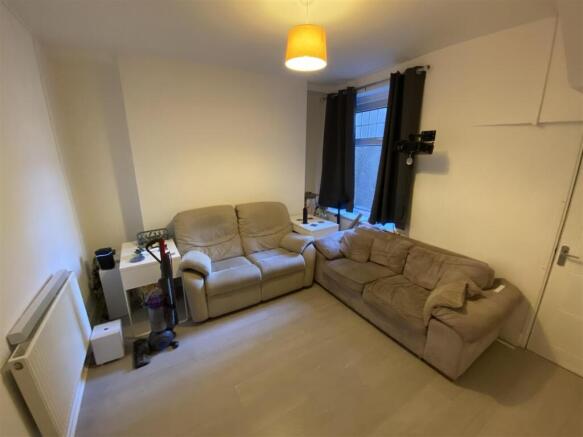 Cosy lounge with comfortable sofas and window...