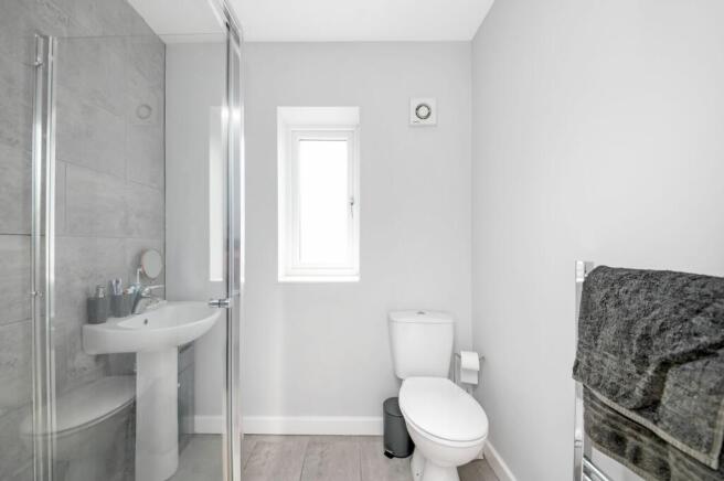 BEDROOM ONE EN-SUITE SHOWER ROOM