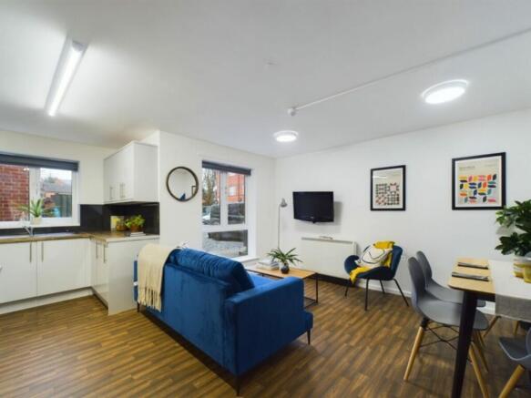 A bright and inviting large modern living room,...