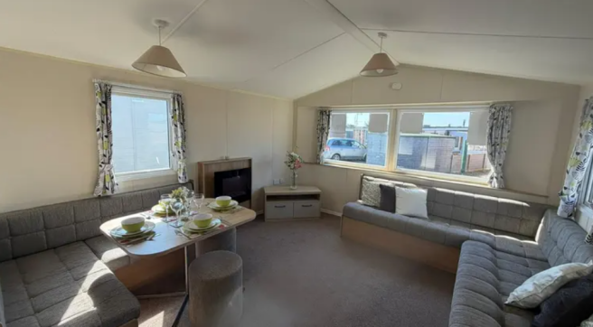 Bright Lounge With L Shaped Seating And Dining Are