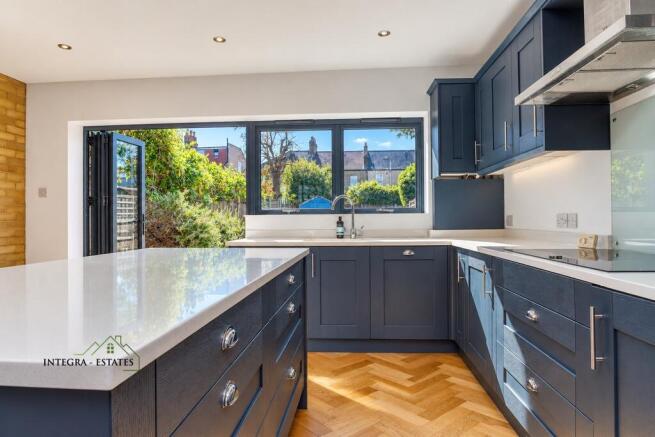braidwood-road-se6-kitchen-blue-cabinets-island-ga