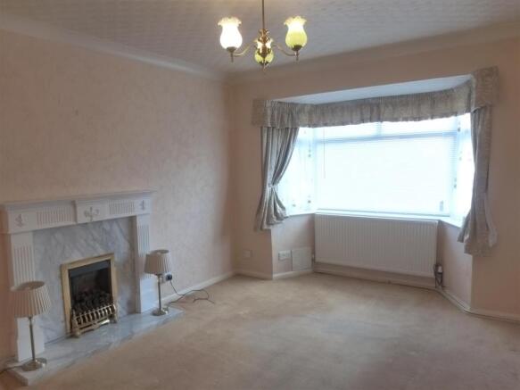 SITTING ROOM (FRONT)