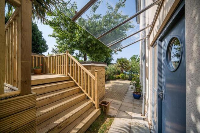 Steps to western terrace from front door