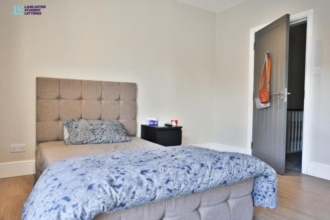 Bright and modern bedroom with double bed...