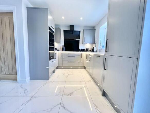 Kitchen with lights on