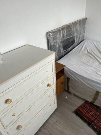 Bright bedroom with ample storage space...