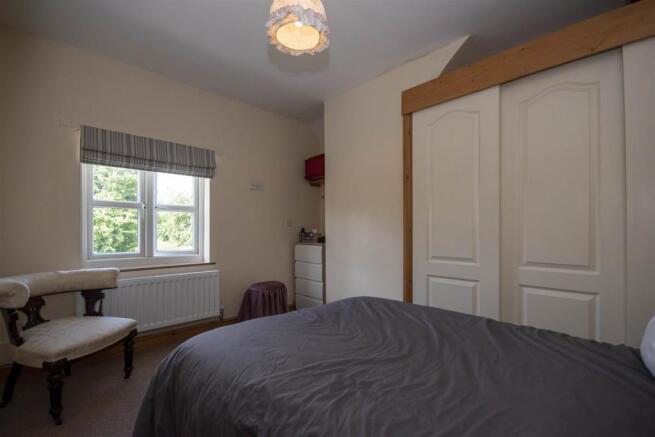FIRST BEDROOM
