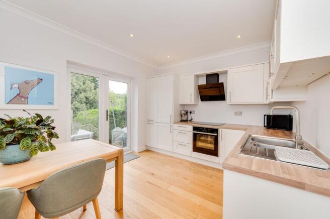SITTING ROOM DINING ROOM AND DINING KITCHEN
