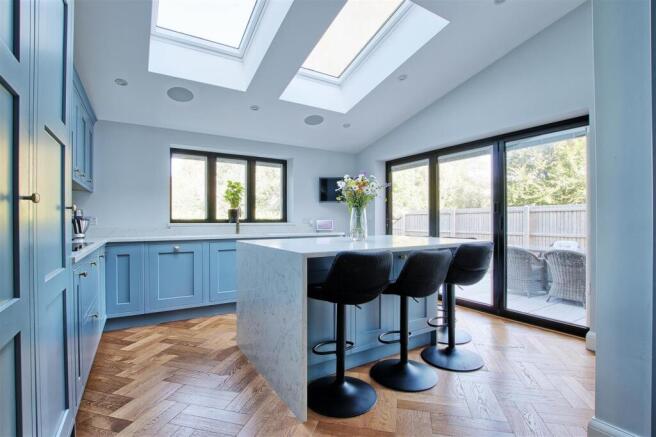 Kitchen shwoing island and breakfast area.jpg