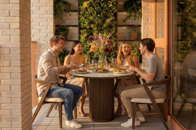 Group sat on balcony outside