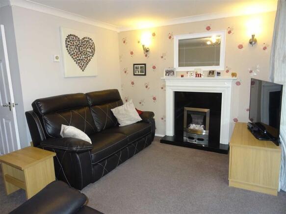 Spacious L-shaped lounge/dining room (rear)