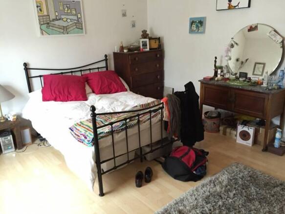 Spacious double bedroom with ample storage...