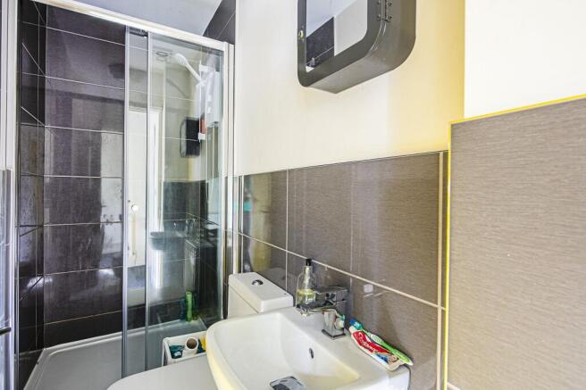 Modern bathroom with stylish tiling and shower....