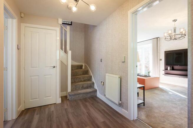 Living spaces on either side of the hallway