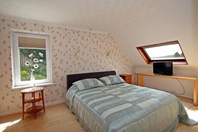 Master Bedroom With 