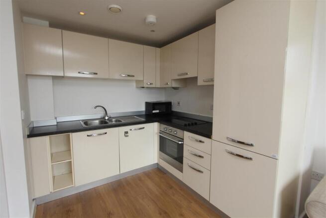 Modern fitted kitchen with ample storage space...